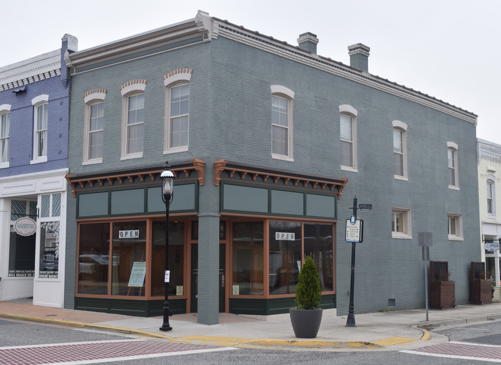 Wider view of the LSCEX shop exterior at the corner of Green Street
